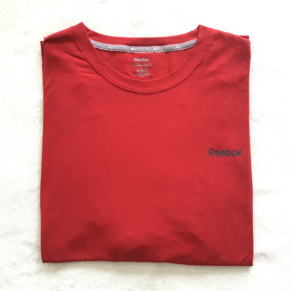 Men’s bright red Reebok shirt sleeved t-shirt